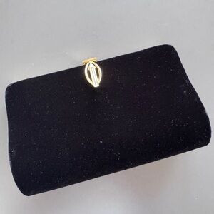 Vintage Luxury Black Velvet Clutch with Gold-Tone Emblem Clasp with chain.